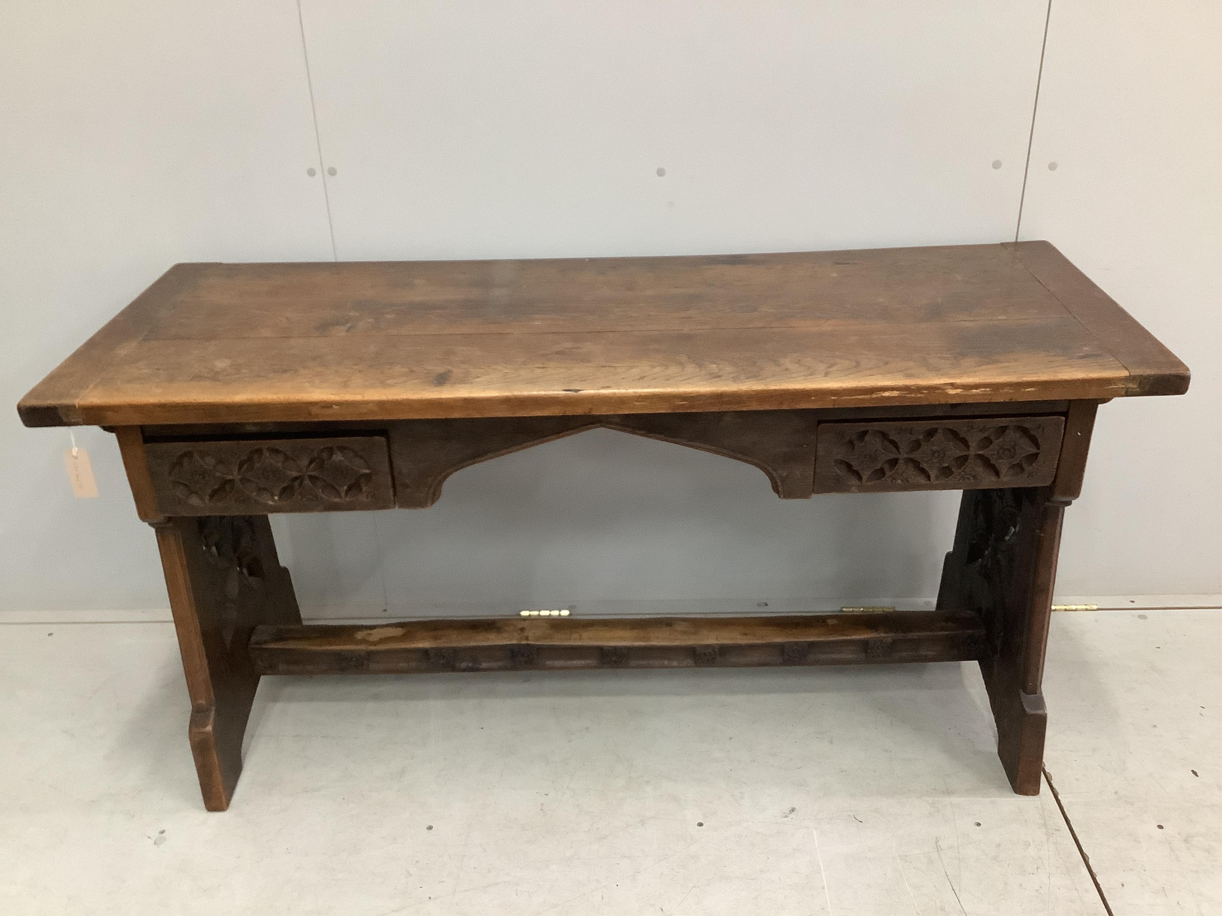 A 17th century style oak serving table, width 153cm, depth 58cm, height 75cm. Condition - fair